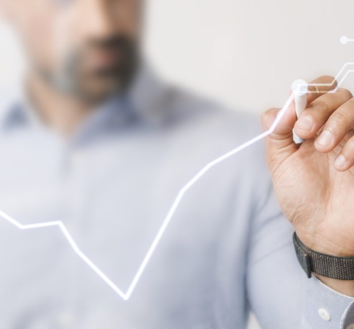 Man giving a business presentation using a futuristic digital pen